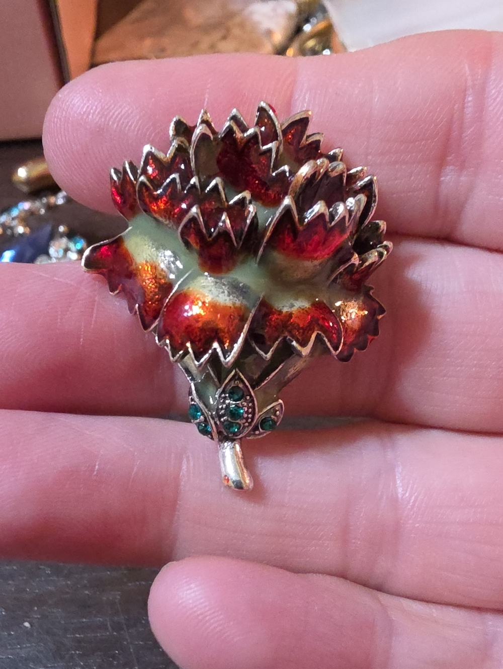 A165- Vintage-Inspired Red Enamel Floral Brooch with Green Accents